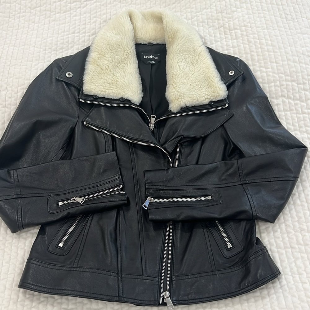Brand New without tags Bebe leather jacket with fur collar size M